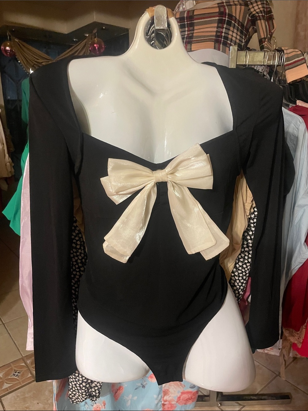 Cider Black Long-Sleeve Bodysuit with Ivory Bow Accent
